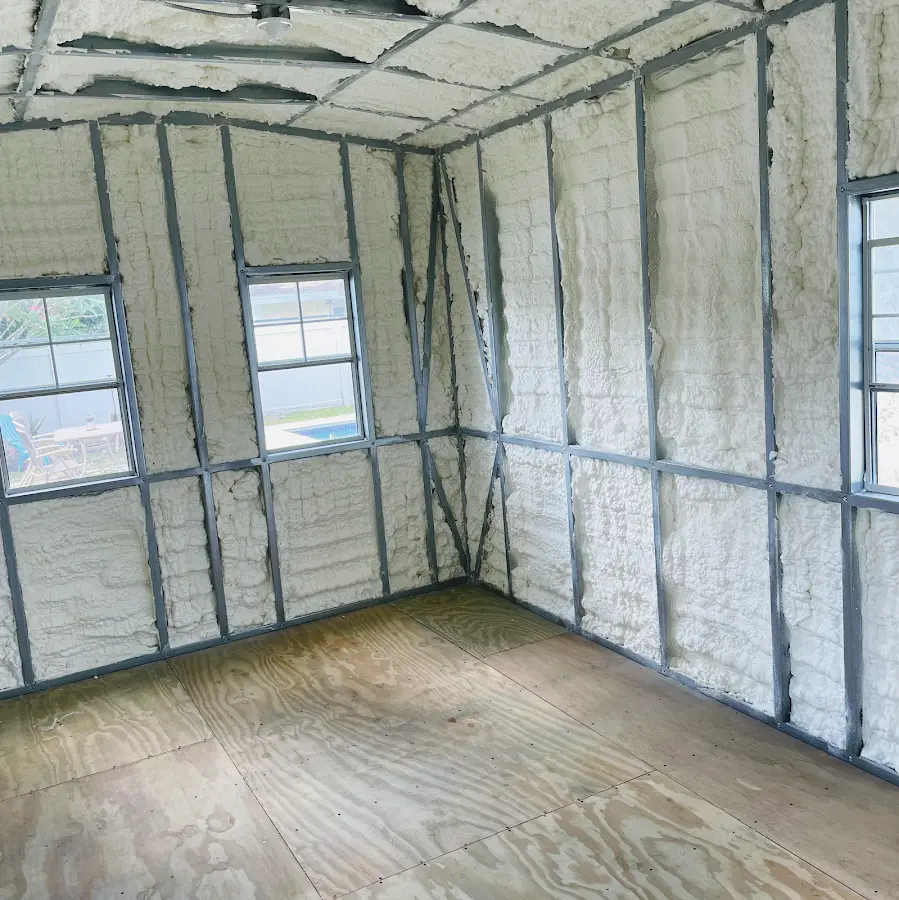 Closed-cell spray foam insulation applied to wall cavities in a residential project in Martins Ferry